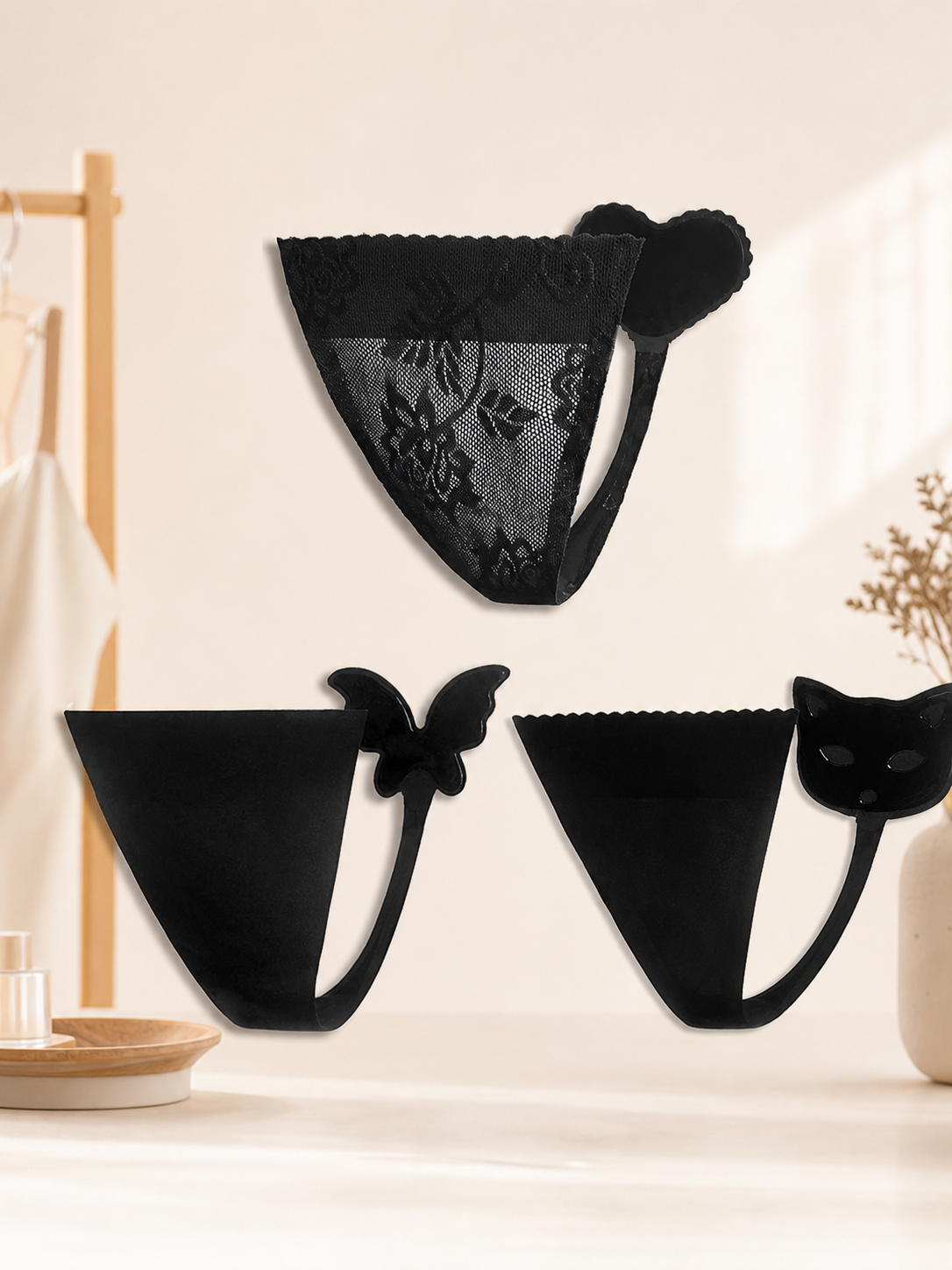 Black thongs, 3 designs, size S