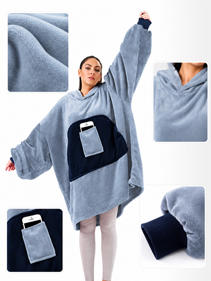 This hooded long coat features a sky blue body with navy patchwork front panels main product view