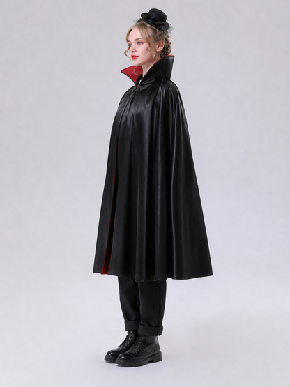 The long black cape is designed to create a vampire look for cosplay, Halloween, and stage performances. The cape is black and features a loose silhouette with long, draping panels and an opening lower edge. The upper section has a hooded o