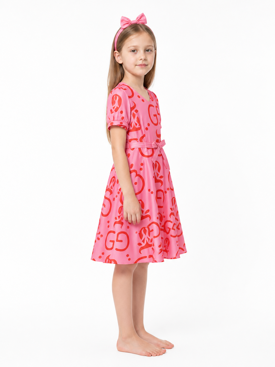 Children's Pink Dress with Red Print and Headband side view