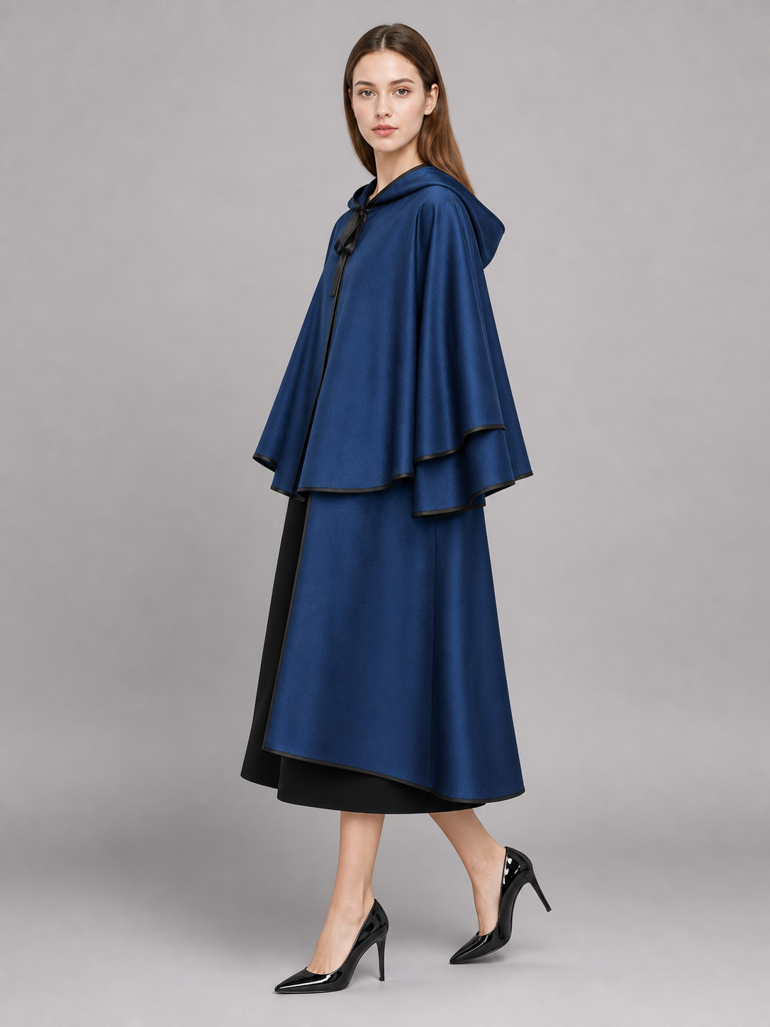 Blue hooded carnival cloak with black trim