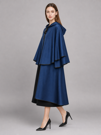 Blue hooded carnival cloak with black trim