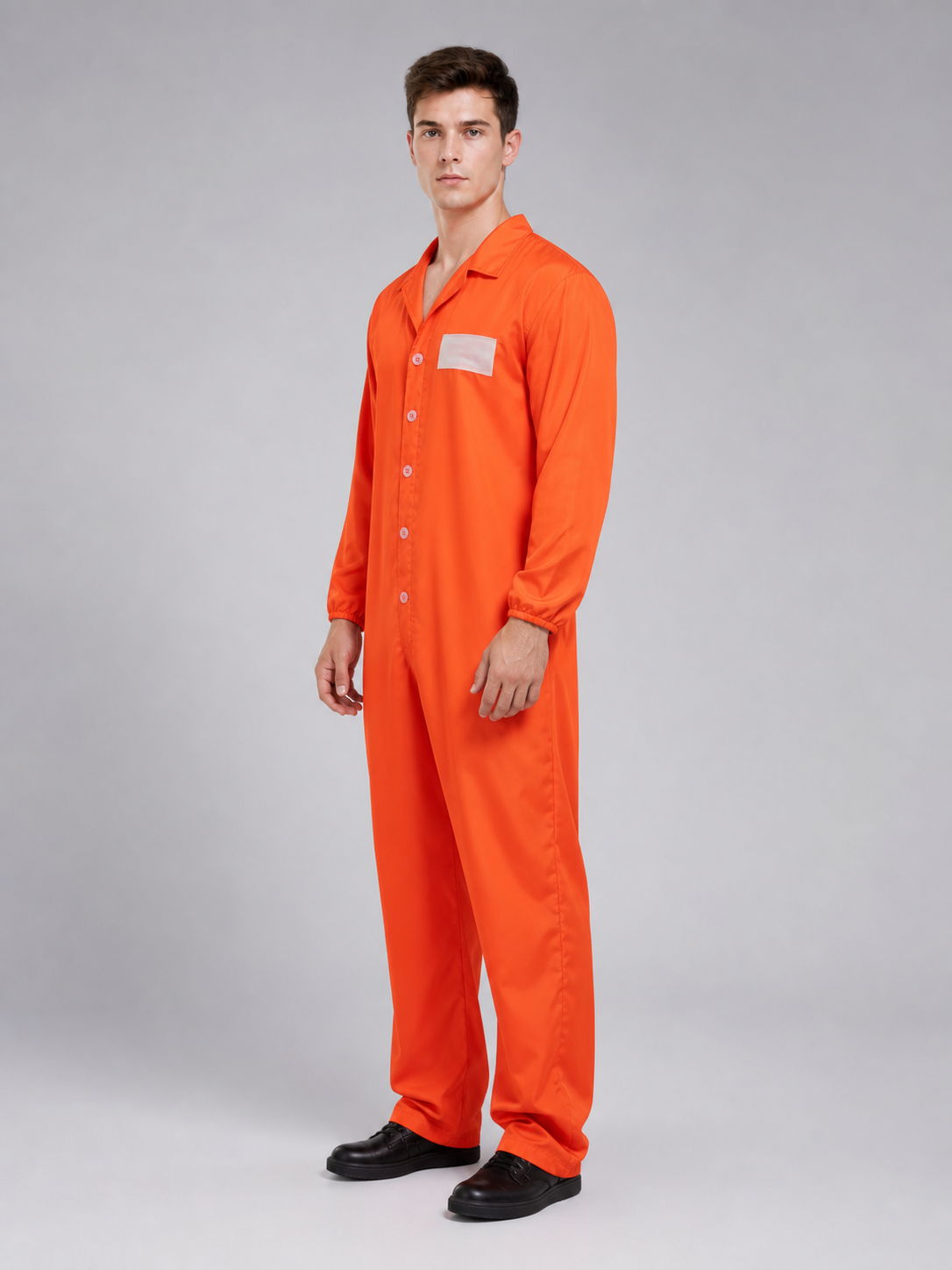 Orange coverall with a smooth fabric look and collared neckline, shown from the back in a close view of the upper body and sleeves