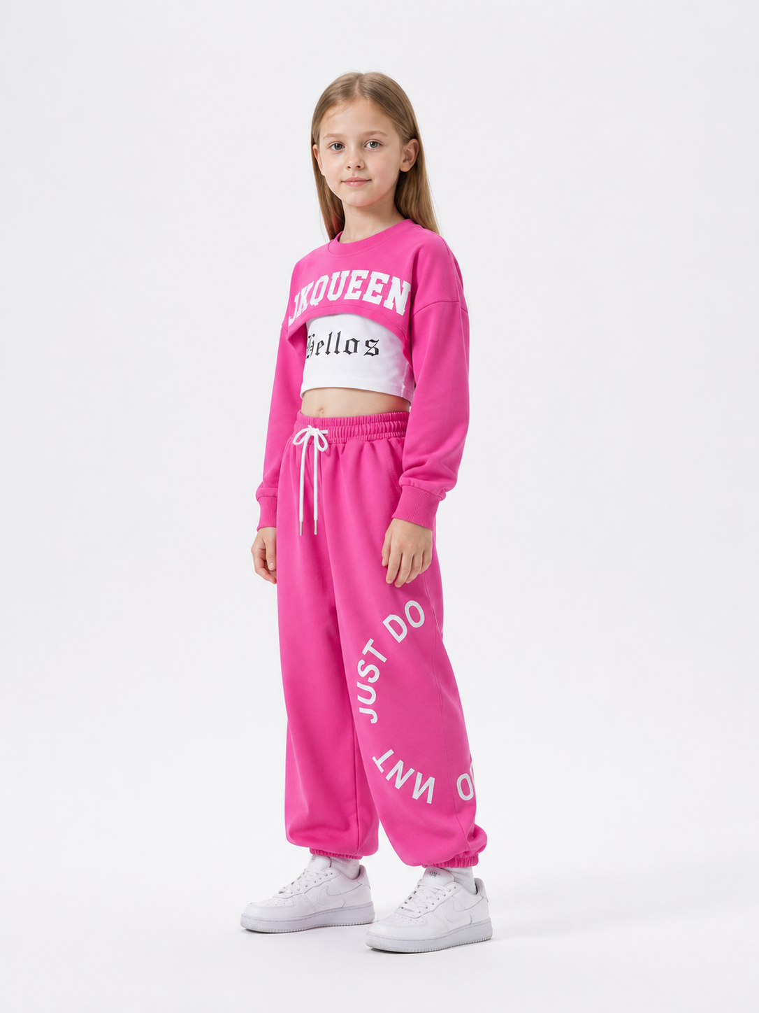 Children's outfit with a cropped top and sweatpants side view