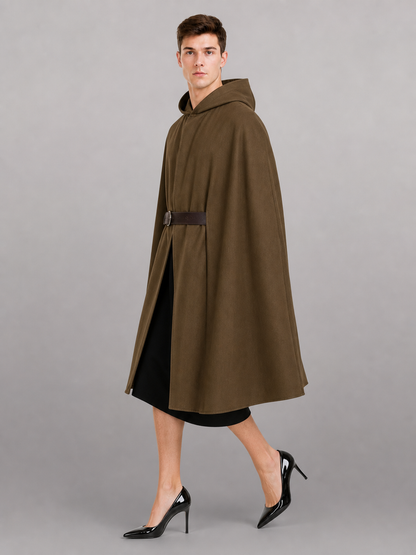Side view of a brown hooded vest with a dark belt on a male model wearing a black outfit and black high heels