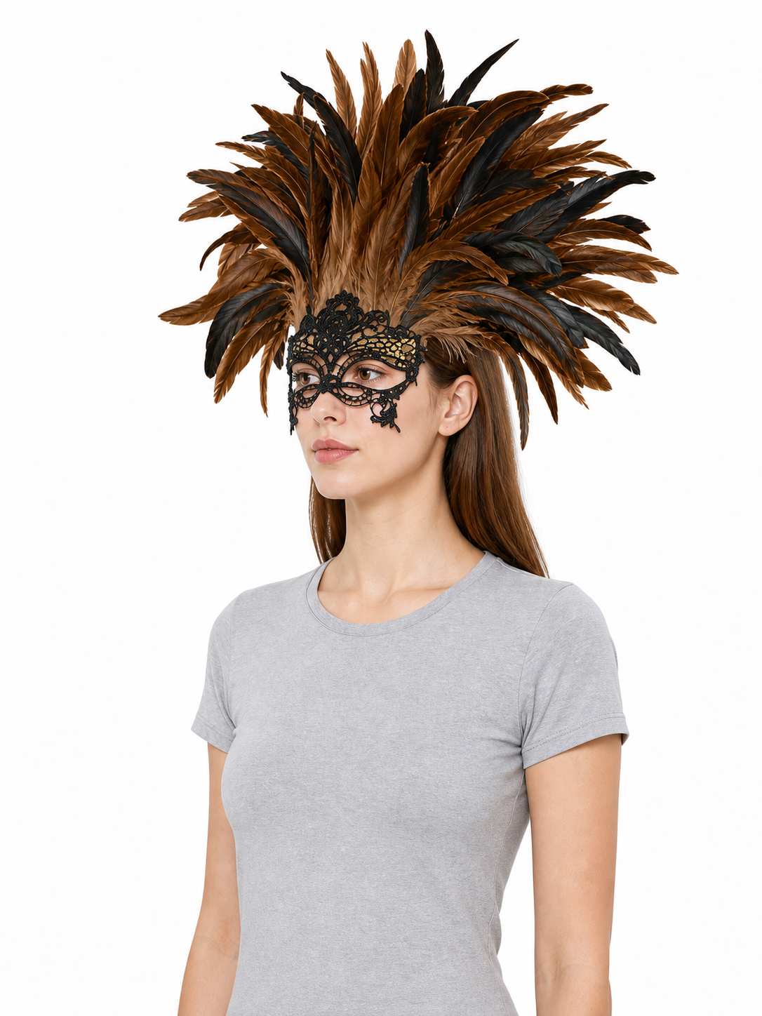 Three-quarter view of a model wearing a brown and black feathered headpiece with a black lace eye mask and gray T-shirt