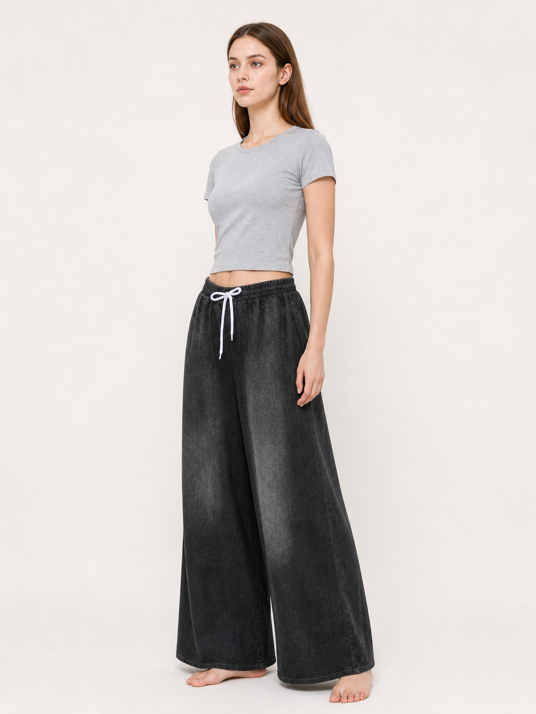 Solid Black Wide-Leg Pants with Elastic Waist and Contrast White Drawstrings side view 2