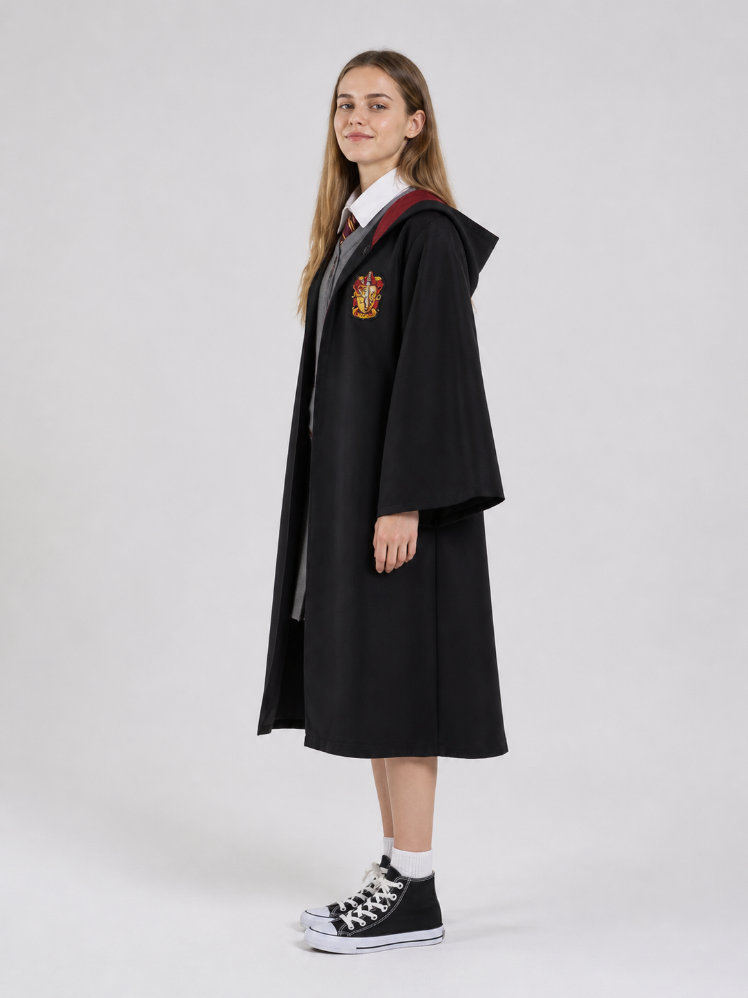 Costume with a Long Black Robe and Red Lining side view