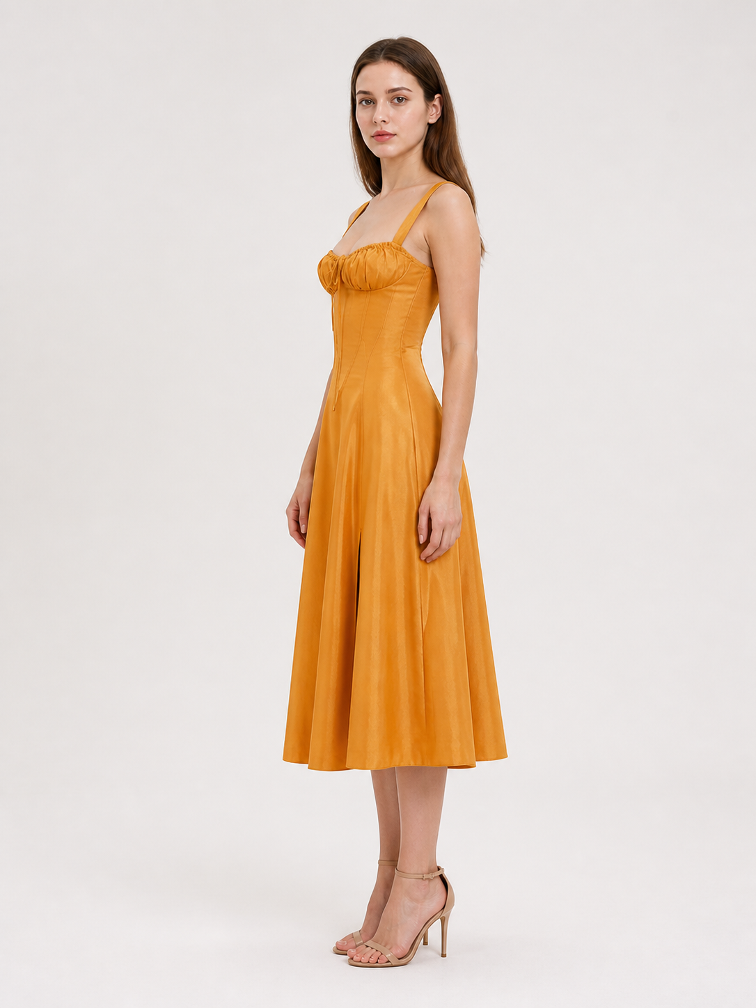 Strappy, fitted dress with a flared skirt side view