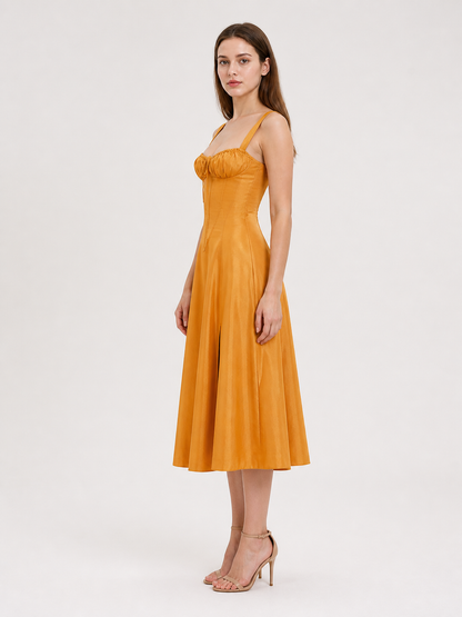 Strappy, fitted dress with a flared skirt side view