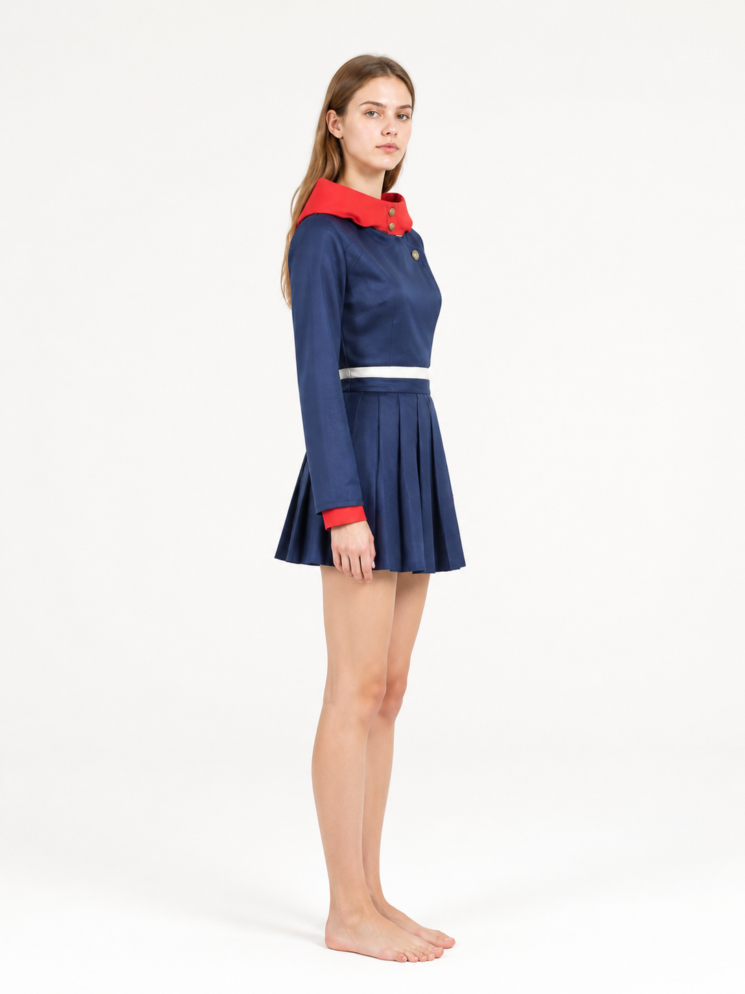 Anime cosplay costume with a pleated skirt, blue and red side view
