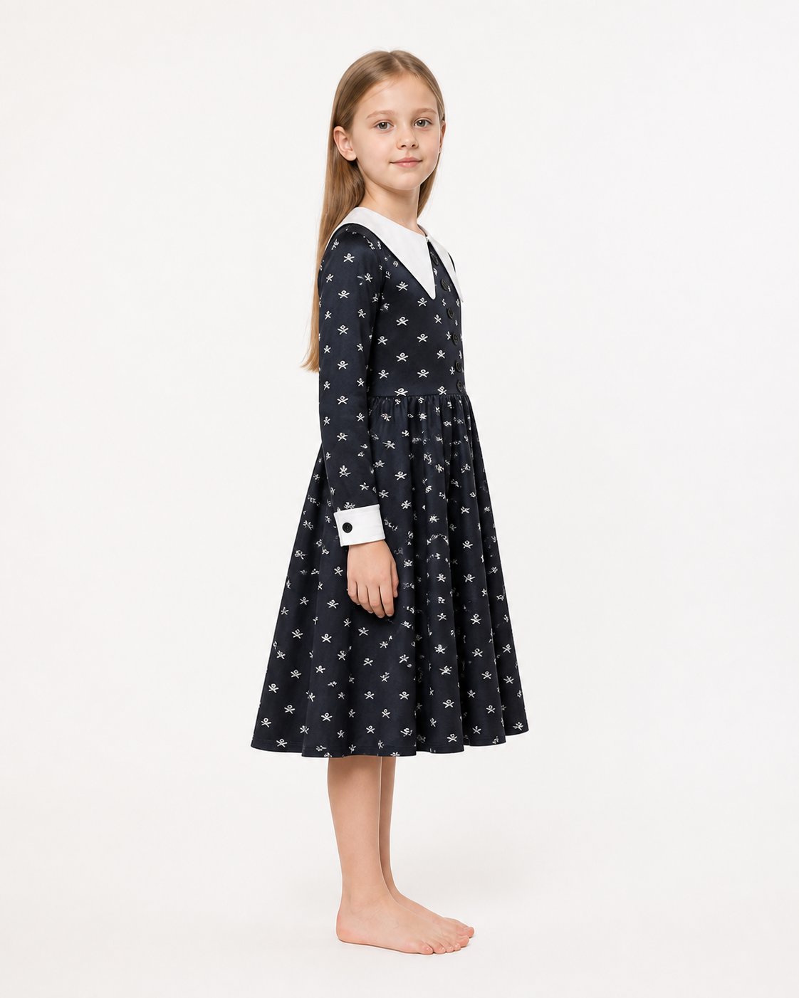 Children’s Halloween costume dress with skeleton print side view