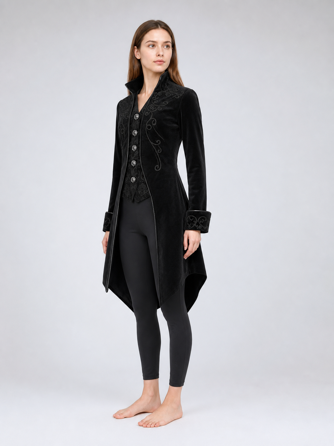 Black embroidered coat with a stand-up collar and pointed tails
