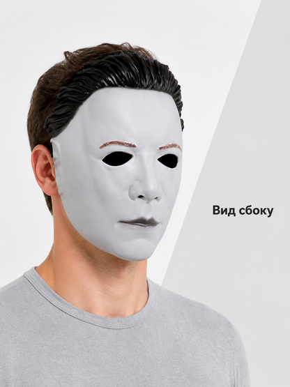 Side-view information card showing the white face mask with black hair worn by a man in a gray shirt
