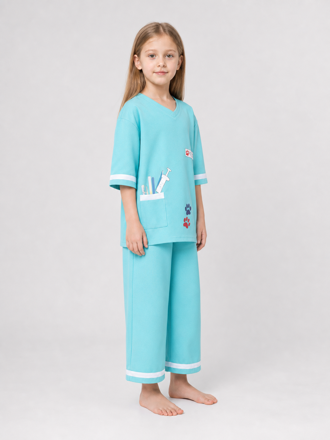 Veterinarian Medical Uniform Role-Play Costume: The set includes a short-sleeve V-neck top with a patch chest pocket and loose-fitting pants with white trim stripes along the bottom edge. The costume is light turquoise with white accents an