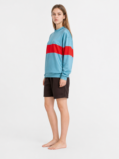 Cosplay costume with a light blue sweatshirt and shorts
