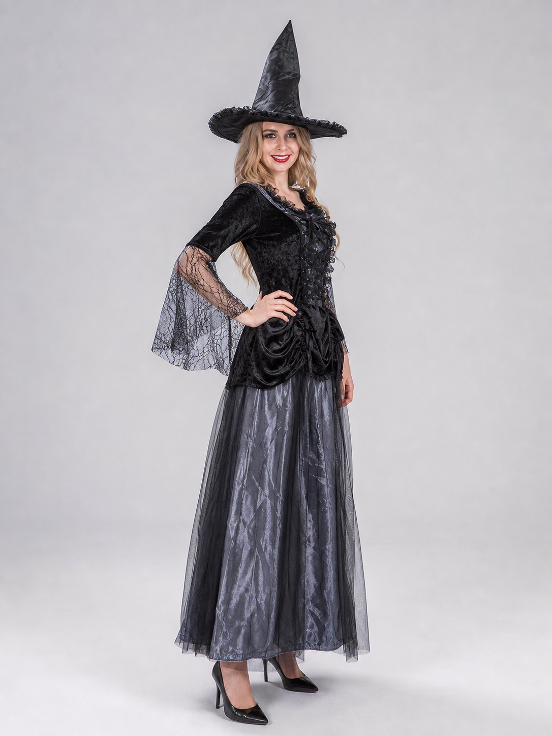 The gray-and-black witch costume is designed in a retro style and includes a side view