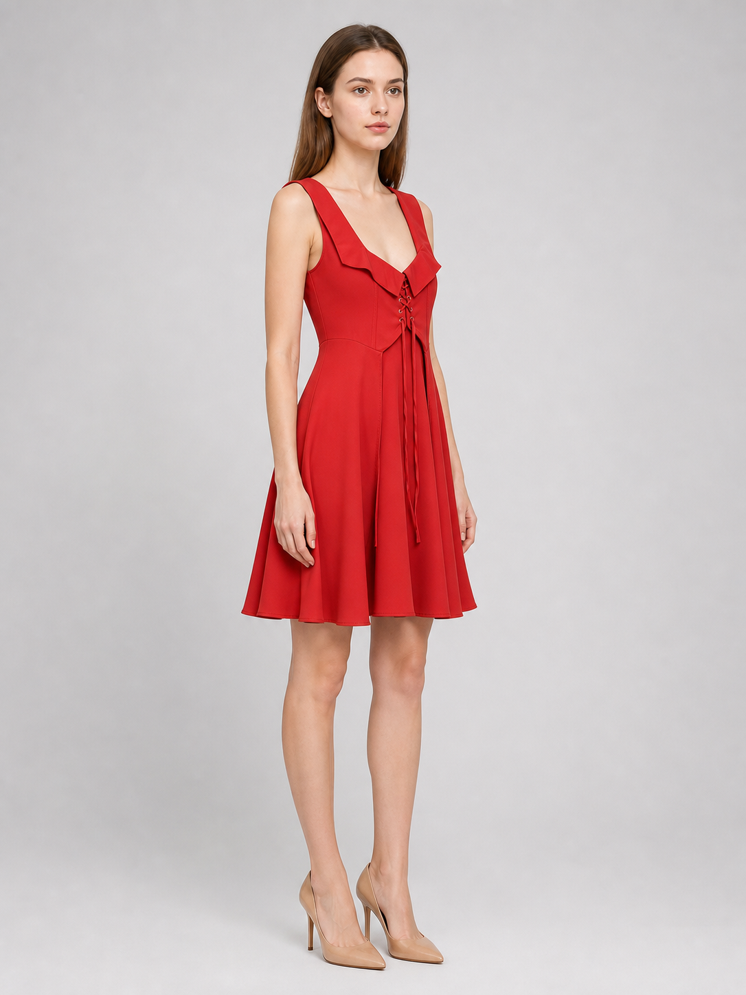 The red dress is designed in a vintage corset style and is suitable for costume events, themed parties, stage performances, and special occasions. The sleeveless design features a wide rounded neckline and a fitted bodice with structured pa