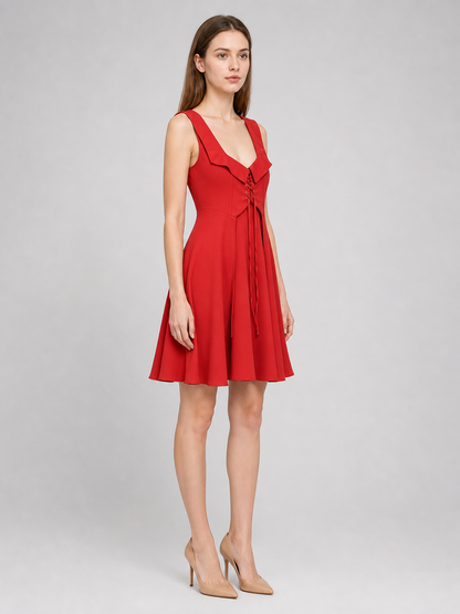 The red dress is designed in a vintage corset style and is suitable for costume events, themed parties, stage performances, and special occasions. The sleeveless design features a wide rounded neckline and a fitted bodice with structured pa