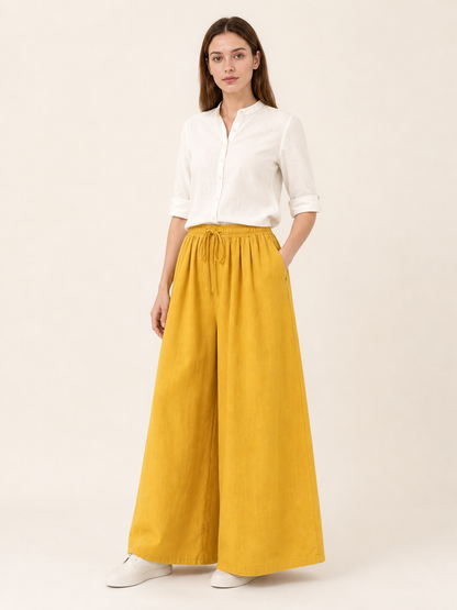 Mustard-colored wide-leg pants with long pant legs