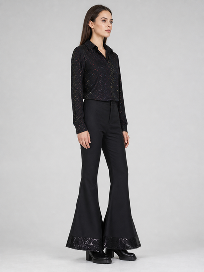Retro disco-style stage performance costume. The set includes a black side view