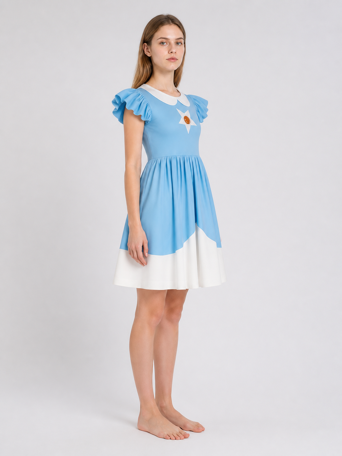 Children's Dress with a Full Skirt and Star Decoration side view