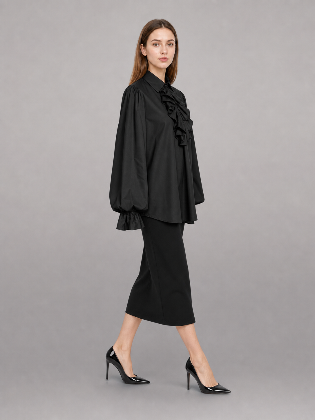 Black blouse with a high collar and ruffle
