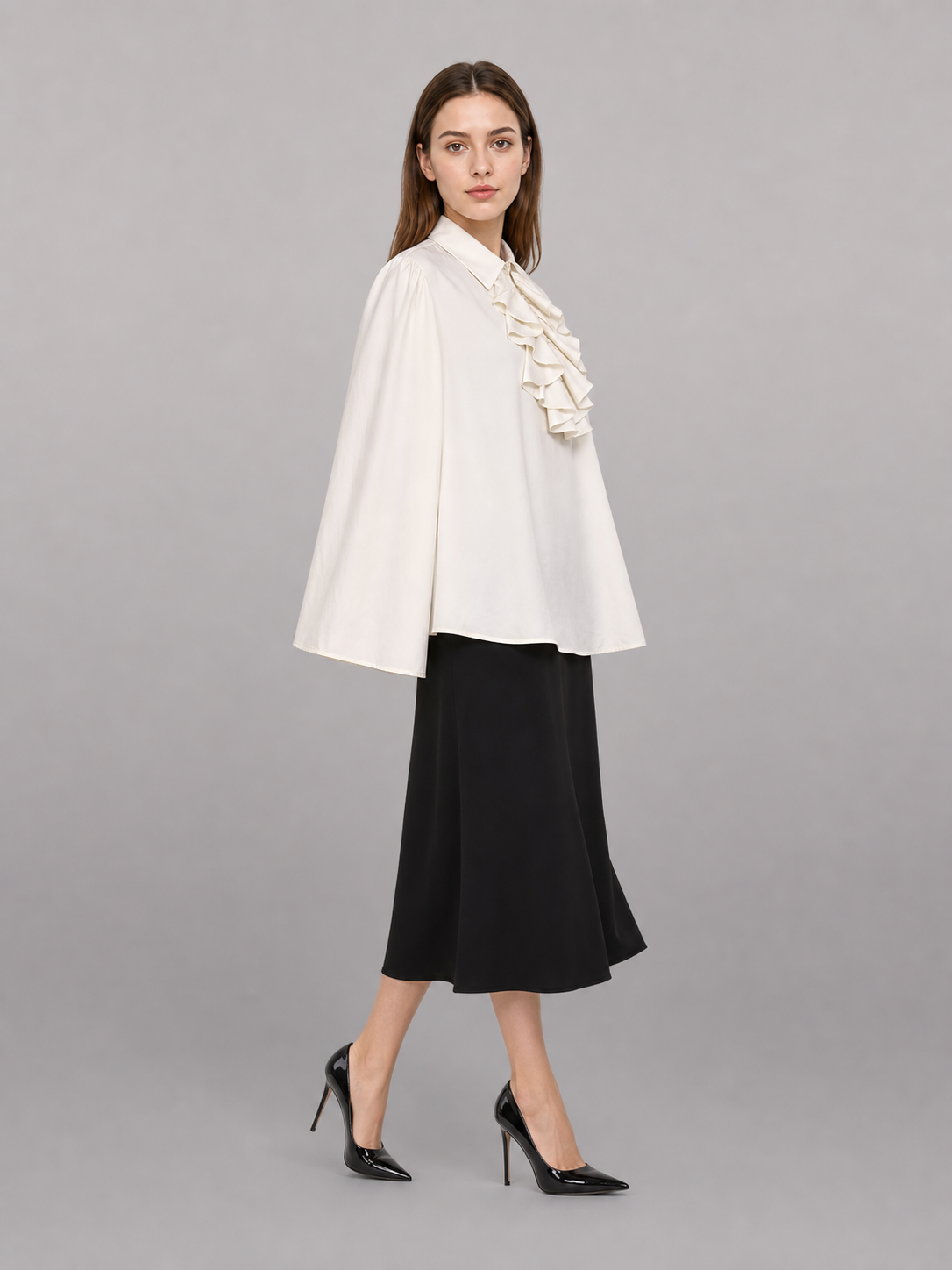White blouse with a high collar and ruffles