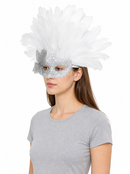 Side view of a white feather and silver filigree masquerade mask worn by a model in a gray T-shirt