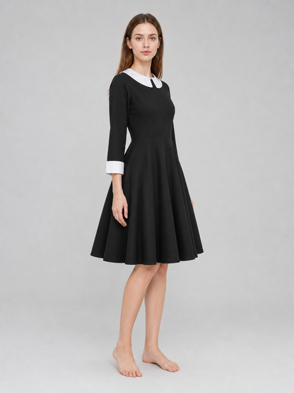 Black Wednesday-style dress with a white collar side view 2