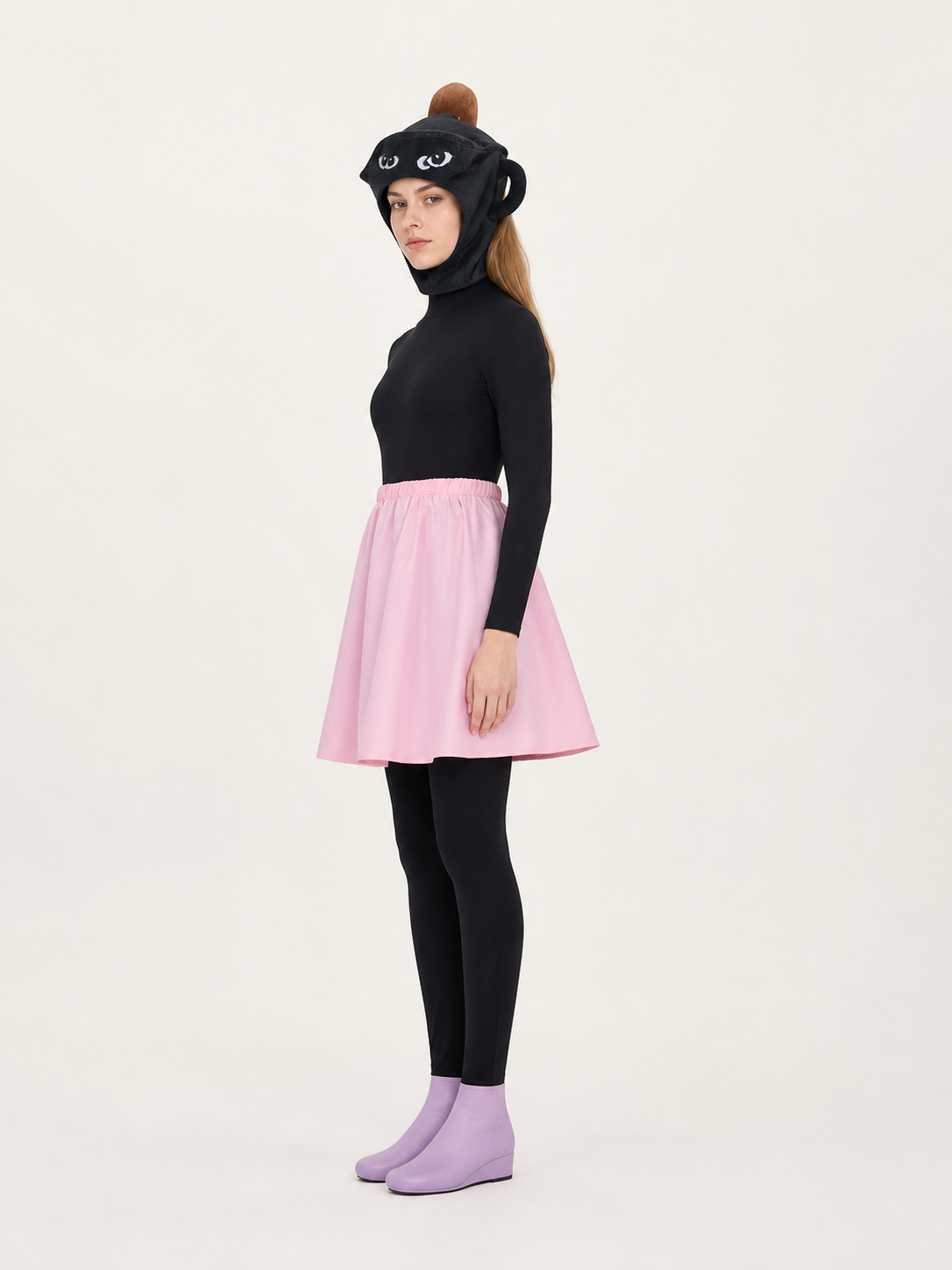 Cosplay costume with jumpsuit, skirt, and headpiece side view