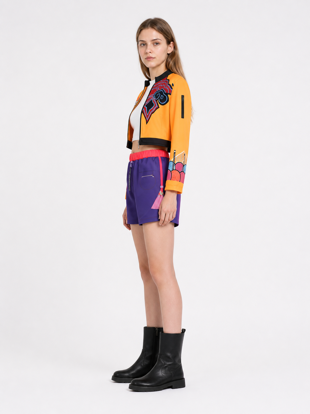 Cosplay costume with jacket, top, and shorts side view
