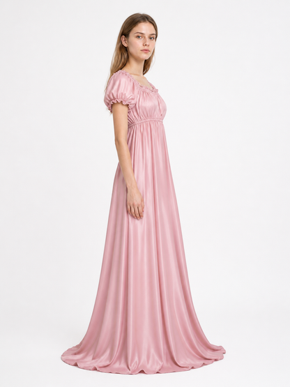 Long fitted dress with puff sleeves and a jabot side view