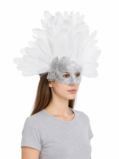 Three-quarter view of a white feather and silver filigree masquerade mask worn by a model