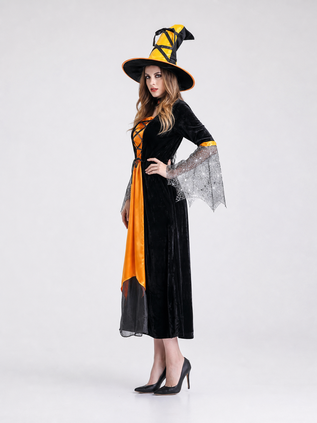 Halloween witch costume with dress and hat side view 2