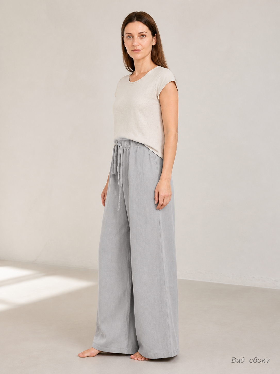 Gray wide-leg jeans with a drawstring and elastic waistband side view 2