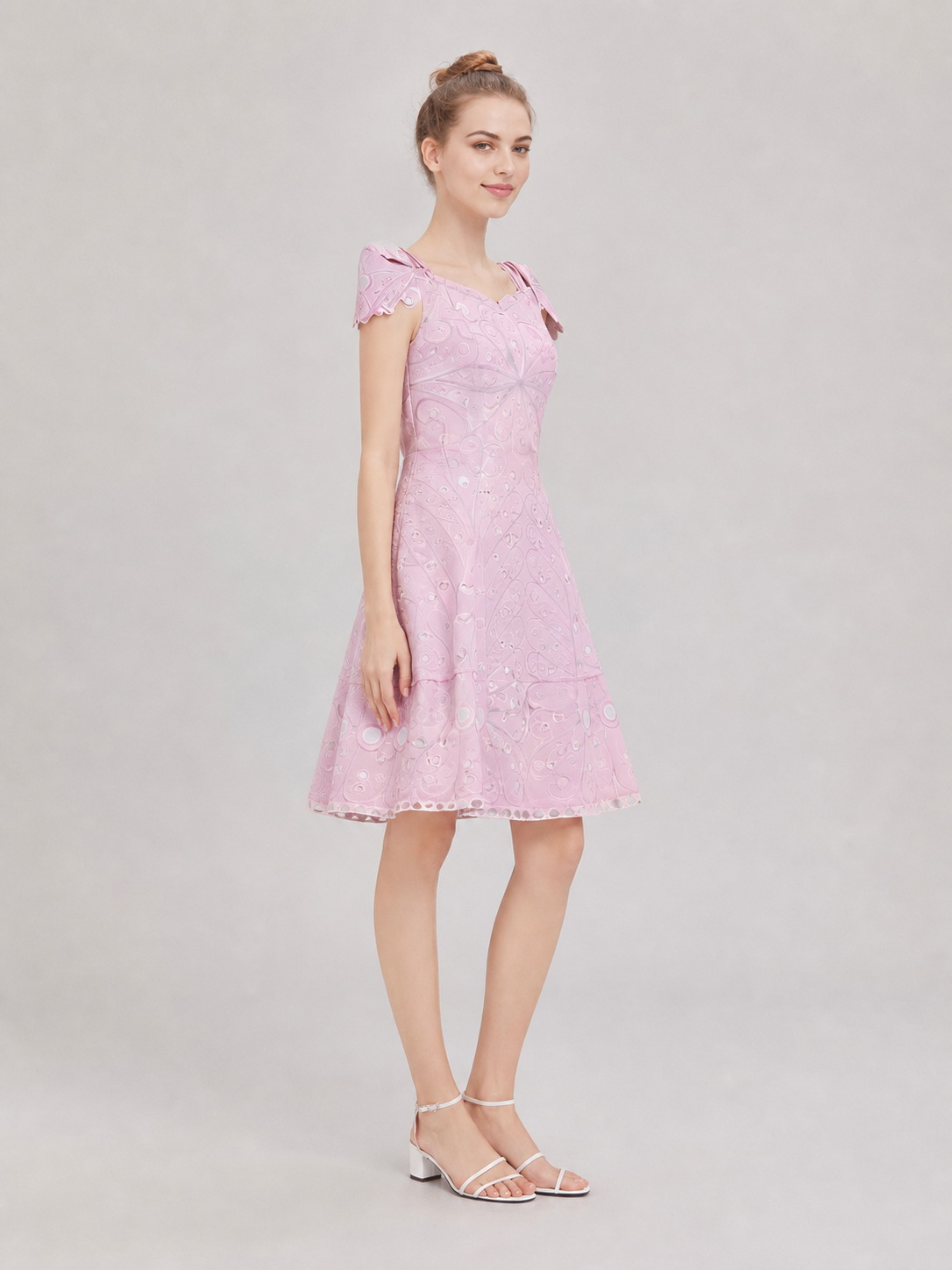 Pink cosplay dress inspired by the film “Wicked 2.” The design features a side view