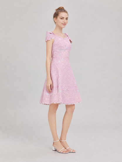 Pink cosplay dress inspired by the film “Wicked 2.” The design features a side view
