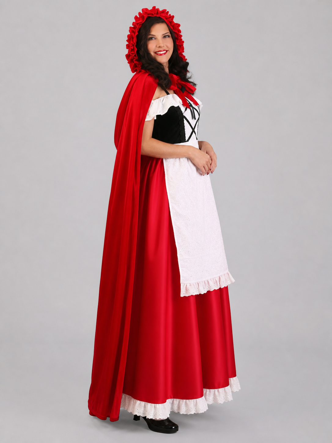 Red Riding Hood costume set designed as a dress with a cape, suitable for stage performances, festive dress-up, and themed cosplay. The set includes a costume combining a red dress with a full silhouette, a white apron-style front, and a re