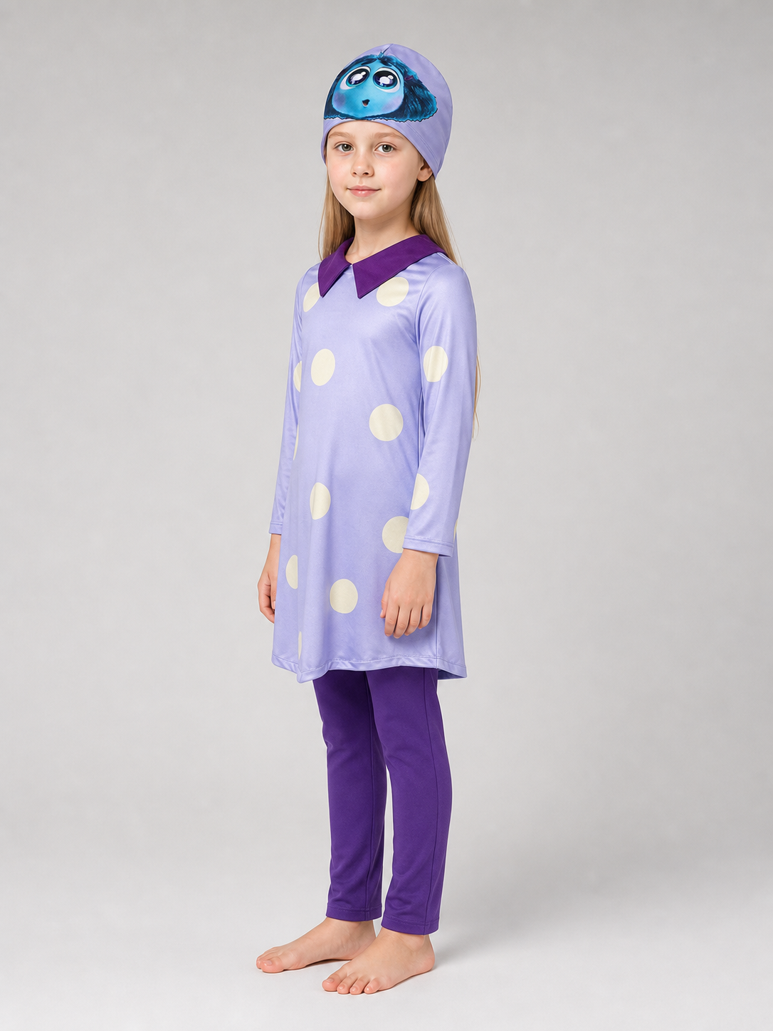 A bright costume set in the style of the character from Inside Out 2 is designed for a themed look and an eye-catching transformation. The set includes a long-sleeve tunic dress, matching leggings, and a headpiece with the character’s face 