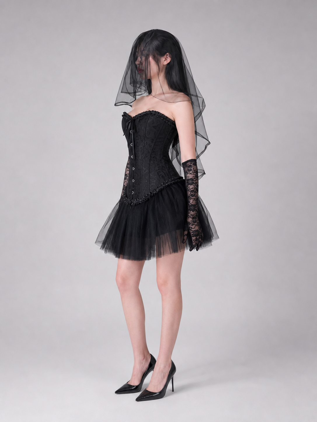 Gothic costume with corset, veil, and gloves