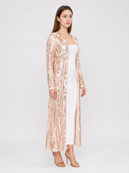 Long sequined cape with embroidery and a baroque pattern