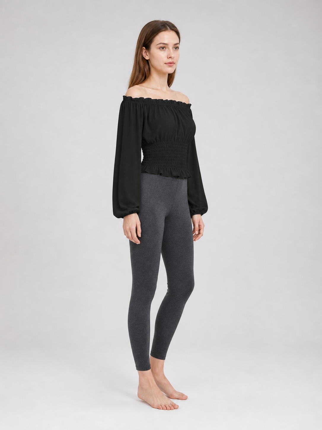 Black off-the-shoulder blouse with ruffles
