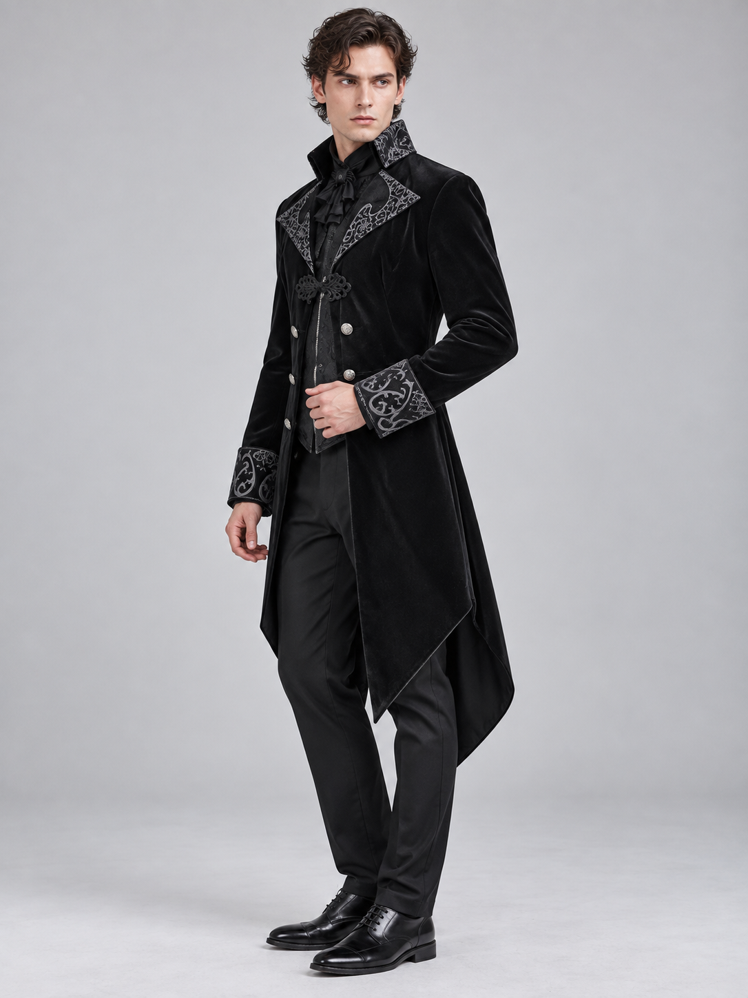 Black tailcoat with a high collar and silver embroidery