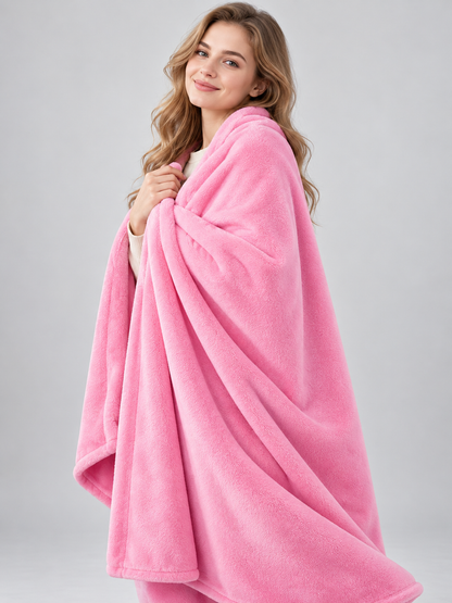Pink solid-color blanket with a soft fuzzy surface