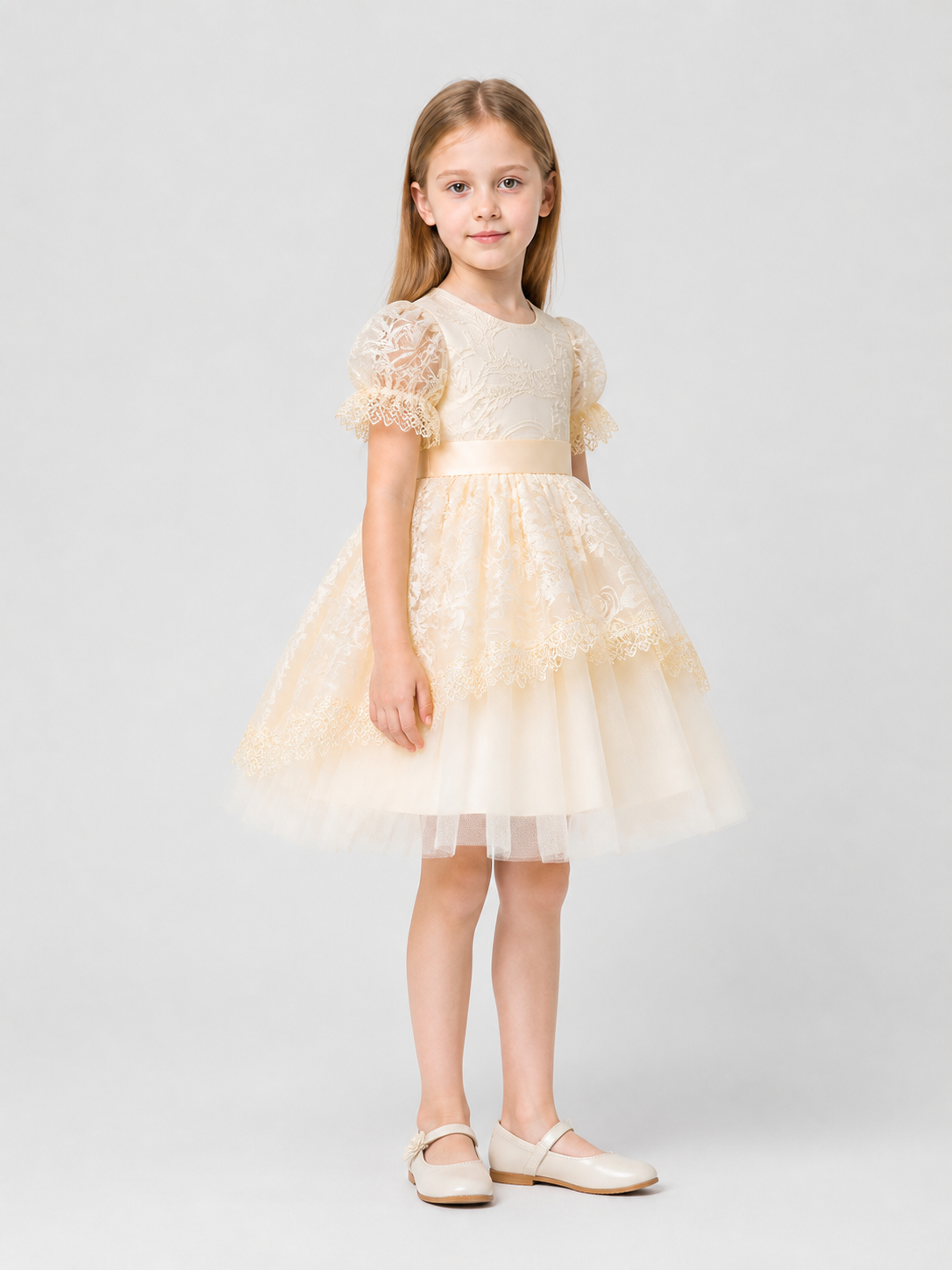 Elegant lace dress with a full skirt and bow side view