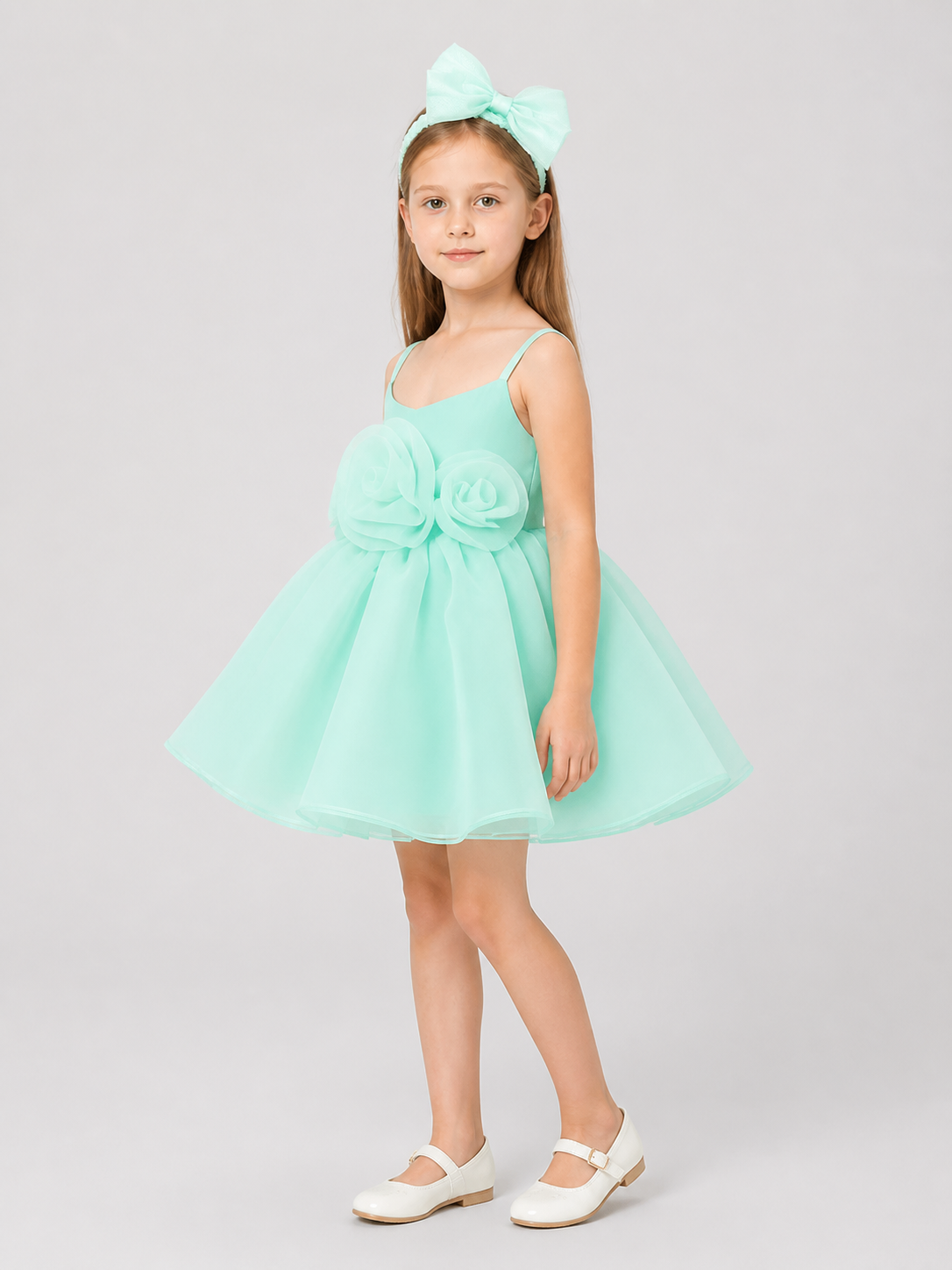 Short, Elegant Mint Dress with Roses and a Full Skirt side view