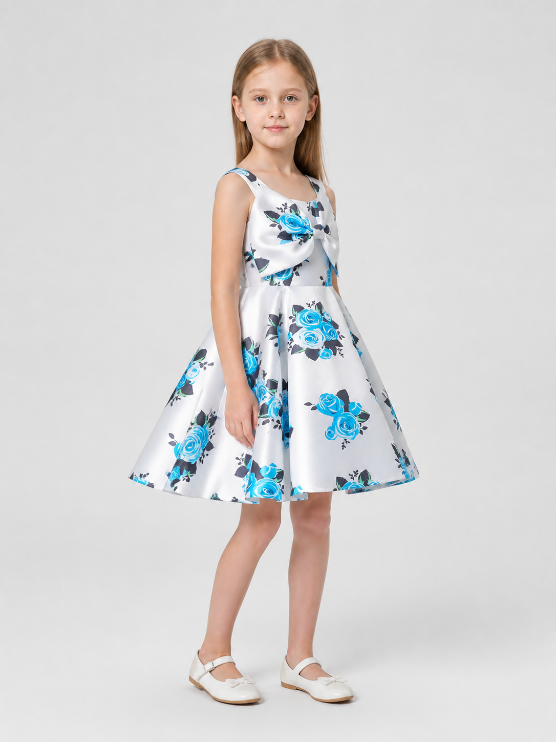 Girls’ sundress with a bow and floral print side view