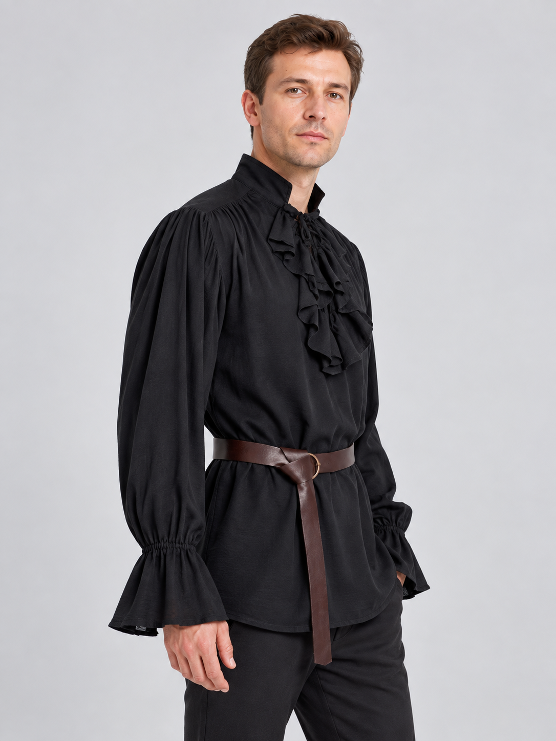 Black shirt with high collar and ruffles, with belt