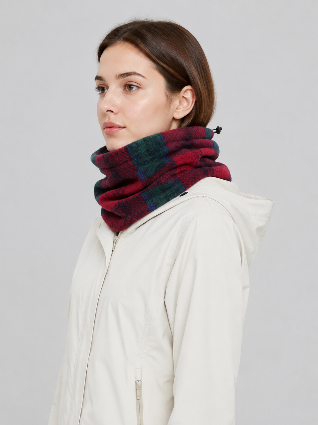 Insulated red neck gaiter with a plaid pattern side view